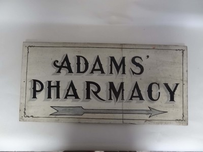 Adam's Pharmacy Sign